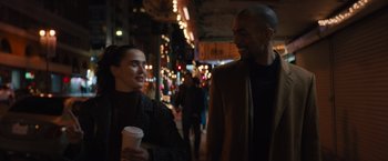 Movie still from “Something from Tiffany's” (2022), directed by Daryl Wein – A man and a woman walking down a street; Medium shot, Over the shoulder angle