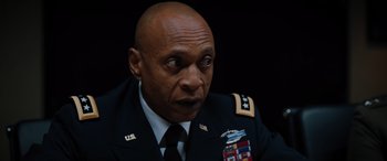 Movie still from “Sonic the Hedgehog” (2020), directed by Jeff Fowler – A person wearing a military uniform; Close Up shot, Low angle