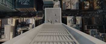 Movie still from “Sonic the Hedgehog” (2020), directed by Jeff Fowler – An aerial view looking down at a building with stairs; Extreme Wide shot, Overhead angle