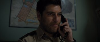 Movie still from “Sonic the Hedgehog” (2020), directed by Jeff Fowler – A person talking on a phone; Close Up shot, Low angle