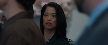 Movie still from “Sonic the Hedgehog” (2020), directed by Jeff Fowler – A person wearing a suit; Close Up shot, Over the shoulder angle