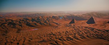 Movie still from “Sonic the Hedgehog” (2020), directed by Jeff Fowler – An aerial view of a desert with a pyramid in the background; Extreme Wide shot, High angle