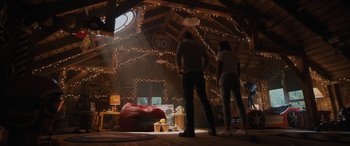 Movie still from “Sonic the Hedgehog” (2020), directed by Jeff Fowler – A man and a woman standing inside of a barn; Wide shot, Low angle