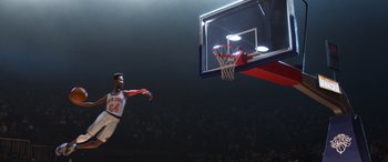Movie still from “Soul” (2020), directed by Kemp Powers – A man in a red and white uniform is playing basketball; Wide shot, Low angle