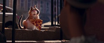Movie still from “Soul” (2020), directed by Kemp Powers – A cat holding a slice of pizza in its mouth; Extreme Close Up shot, Over the shoulder angle