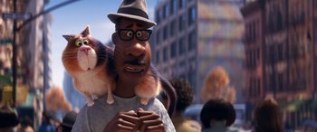 Movie still from “Soul” (2020), directed by Kemp Powers – A man with a cat on his shoulders; Close Up shot, Low angle