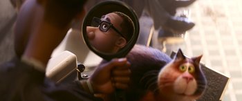 Movie still from “Soul” (2020), directed by Kemp Powers – A person is holding up a mirror to look at it's reflection; Close Up shot, Over the shoulder angle