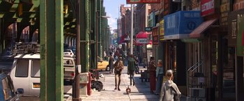 Movie still from “Soul” (2020), directed by Kemp Powers – A group of people walking down a sidewalk; Wide shot, High angle