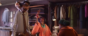 Movie still from “Soul” (2020), directed by Kemp Powers – A group of people standing in a room; Medium shot, Over the shoulder angle