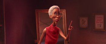 Movie still from “Soul” (2020), directed by Kemp Powers – An old woman is standing in front of a mirror; Medium shot, Low angle