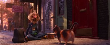 Movie still from “Soul” (2020), directed by Kemp Powers – A cat standing next to a person sitting on the ground; Wide shot, Over the shoulder angle