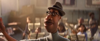 Movie still from “Soul” (2020), directed by Kemp Powers – An animated man wearing a hat and a sweater; Close Up shot, High angle