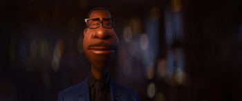 Movie still from “Soul” (2020), directed by Kemp Powers – An animated man with glasses and a suit and tie; Close Up shot, Low angle