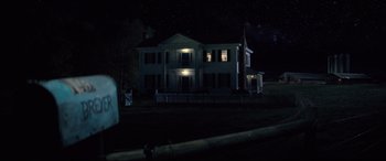 Movie still from “Brightburn” (2019), directed by David Yarovesky – A large white house in the dark at night; Extreme Wide shot, Low angle
