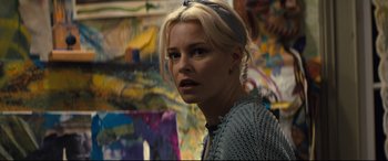 Movie still from “Brightburn” (2019), directed by David Yarovesky – A woman with blonde hair standing in front of a wall; Close Up shot, Over the shoulder angle