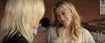 Movie still from “Brightburn” (2019), directed by David Yarovesky – Two women are talking to each other in a brick room; Close Up shot, Over the shoulder angle