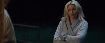 Movie still from “Brightburn” (2019), directed by David Yarovesky – A woman with blonde hair wearing a gray jacket; Medium shot, Over the shoulder angle