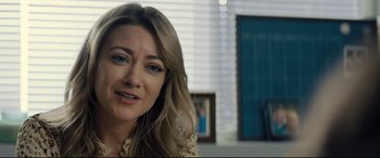 Movie still from “Brightburn” (2019), directed by David Yarovesky – A person with long blonde hair; Close Up shot, Over the shoulder angle