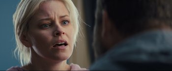 Movie still from “Brightburn” (2019), directed by David Yarovesky – A woman with blonde hair is looking at a man; Close Up shot, Over the shoulder angle