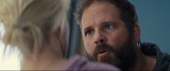 Movie still from “Brightburn” (2019), directed by David Yarovesky – A man with a beard looking into a mirror; Close Up shot, Over the shoulder angle