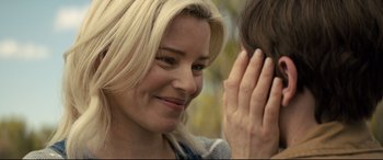 Movie still from “Brightburn” (2019), directed by David Yarovesky – A person with a hand on the ear of another person; Close Up shot, Over the shoulder angle