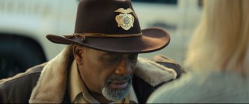 Movie still from “Brightburn” (2019), directed by David Yarovesky – A person wearing a hat; Close Up shot, Over the shoulder angle