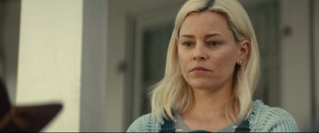 Movie still from “Brightburn” (2019), directed by David Yarovesky – A woman with blonde hair is looking at the camera; Close Up shot, Over the shoulder angle