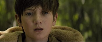 Movie still from “Brightburn” (2019), directed by David Yarovesky – A young boy's face; Close Up shot, High angle