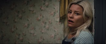 Movie still from “Brightburn” (2019), directed by David Yarovesky – A woman with blonde long hair looking at the camera; Close Up shot, High angle