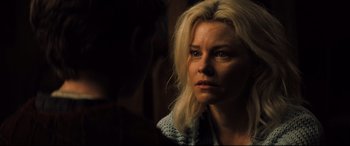 Movie still from “Brightburn” (2019), directed by David Yarovesky – A woman with blonde hair stares into the camera; Close Up shot, Over the shoulder angle