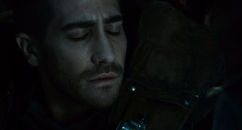Movie still from “Source Code” (2011), directed by Duncan Jones – A person sleeping with his eyes closed; Close Up shot, Overhead angle