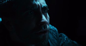 Movie still from “Source Code” (2011), directed by Duncan Jones – A person with a beard; Close Up shot, Low angle