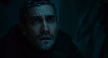 Movie still from “Source Code” (2011), directed by Duncan Jones – A person wearing a jacket; Close Up shot, Low angle