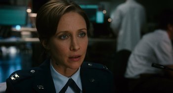 Movie still from “Source Code” (2011), directed by Duncan Jones – A person wearing a uniform; Close Up shot, Over the shoulder angle