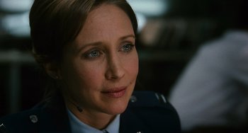 Movie still from “Source Code” (2011), directed by Duncan Jones – A person wearing a uniform; Close Up shot, Over the shoulder angle