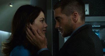 Movie still from “Source Code” (2011), directed by Duncan Jones – A man and a woman looking into each others eyes; Close Up shot, Over the shoulder angle
