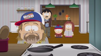 Movie still from “South Park: Joining the Panderverse” (2023), directed by Trey Parker – A group of people standing around a stove; Medium shot, Over the shoulder angle