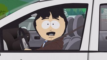 Movie still from “South Park: Joining the Panderverse” (2023), directed by Trey Parker – A man in a car with his mouth wide open; Medium shot, Over the shoulder angle