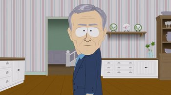 Movie still from “South Park: Joining the Panderverse” (2023), directed by Trey Parker – An older man in a suit is standing in front of a dresser; Medium shot, High angle