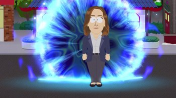 Movie still from “South Park: Joining the Panderverse” (2023), directed by Trey Parker – An animated picture of a woman in a suit; Medium shot, High angle