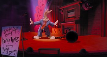 Movie still from “Space Jam” (1996), directed by Joe Pytka – A cartoon of a rabbit wearing a suit on stage; Wide shot, Low angle