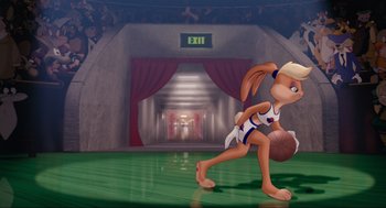 Movie still from “Space Jam” (1996), directed by Joe Pytka – An animated character is playing a basketball game; Wide shot, Low angle