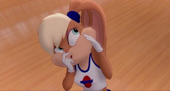 Movie still from “Space Jam” (1996), directed by Joe Pytka – A cartoon of a woman in a white shirt and a blue hat; Close Up shot, High angle