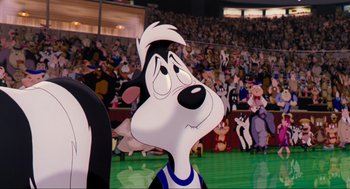 Movie still from “Space Jam” (1996), directed by Joe Pytka – A goofy character in front of a crowd of people; Close Up shot, Low angle