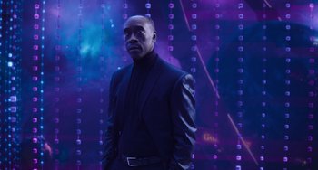 Movie still from “Space Jam: A New Legacy” (2021), directed by Malcolm D. Lee – A man standing in front of a purple background; Medium shot, Low angle