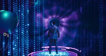 Movie still from “Space Jam: A New Legacy” (2021), directed by Malcolm D. Lee – A man standing in front of an illuminated wall; Extreme Wide shot, Low angle