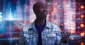 Movie still from “Space Jam: A New Legacy” (2021), directed by Malcolm D. Lee – A man in a metallic jacket looking up; Close Up shot, Over the shoulder angle