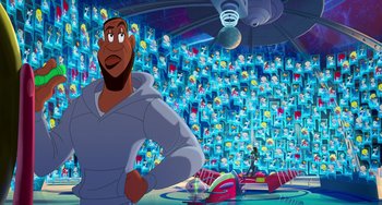 Movie still from “Space Jam: A New Legacy” (2021), directed by Malcolm D. Lee – An animation of a man standing in front of a room full of toys; Wide shot, Low angle