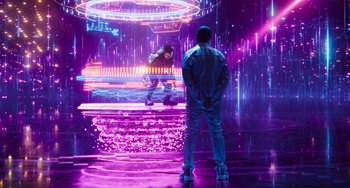 Movie still from “Space Jam: A New Legacy” (2021), directed by Malcolm D. Lee – Two people standing in a room with neon lights; Extreme Wide shot, Over the shoulder angle