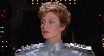 Movie still from “Spaceballs” (1987), directed by Mel Brooks – A person with short hair; Close Up shot, Low angle